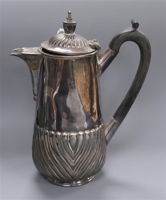 A demi fluted white metal hot water pot.